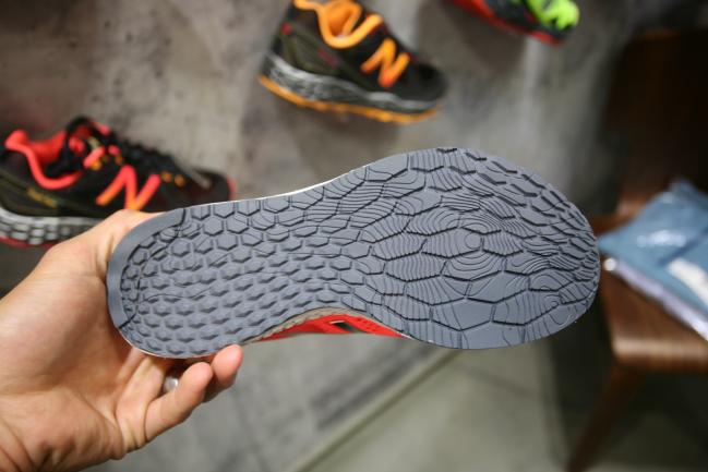 Redesigned outsole based on runner feedback. Mainly they elongated the shapes over the forefoot, but added topo-like grooves to make it more flexible .